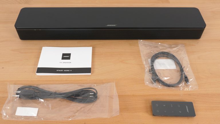 Contents of the package from Bose spread out on the table